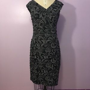 Flattering black and white midi dress!